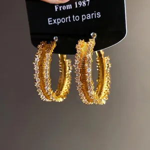 Exquisite 18K gold plated hoop earrings with shimmering zircons for a luxury look