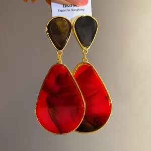 Vintage resin water drop earrings with red smoky pattern and gold-tone frame
