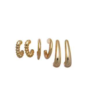 Gold 6-piece C-shaped geometric hoop earrings set with minimalist metallic finish