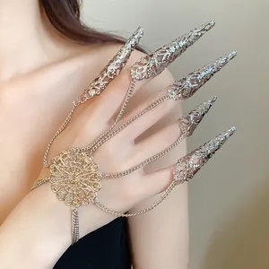 Detailed view of an intricate silver hollow filigree finger cot slave bracelet.
