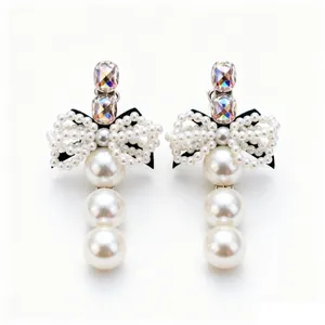 Exquisite rhinestone bow and pearl hair clips for an elegant French style headwear look