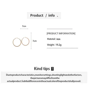 Faceted iron hoop earrings with 7cm diameter and 19.2g weight for a minimalist look.