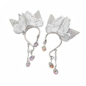 Elegant silver butterfly lace ear cuffs with sparkling crystals and teardrop pendants. Perfect gift.