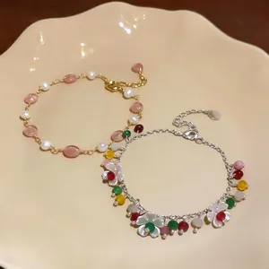 Braccialetto placcato oro 14k con perle e perline colorate stile dopamina su piatto