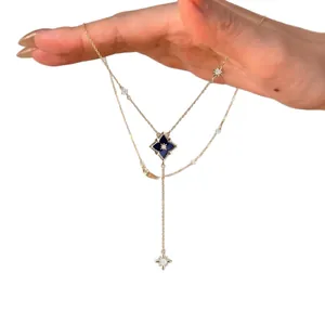 Elegante goldene Halskette mit Stern und Rhombus-Anhänger und Zirkonia für Damen