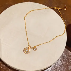 Élégant collier en or de luxe français avec pendentif étoile à huit branches