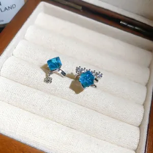 Sparkling blue zircon ear cuffs in sugar cube design with elegant silver-tone finish