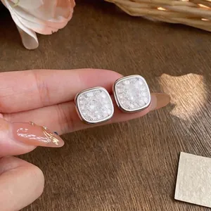 Elegant square stud earrings featuring crushed zirconia in a silver-tone frame