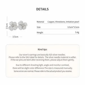 Detail view showing hollow flower earrings with 3.5cm size and 925 silver needles