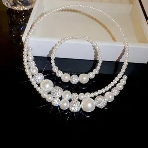 French vintage pearl collar necklace with sparkling rhinestone beads and elegant charm.