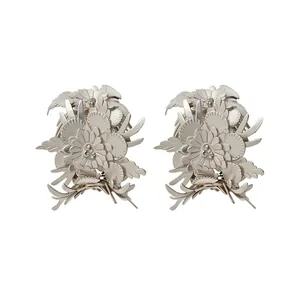 Vintage French style leather floral stud earrings with intricate petal design in silver finish