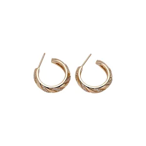 Elegant 14k gold plated twisted hoop stud earrings with pavé cubic zirconia for women