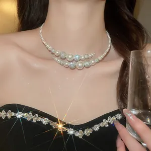 Detailed view of French vintage double-layer pearl choker with sparkling crystal beads