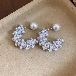 Elegant French style C-shaped earrings with white pearls and rhinestones design