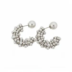 Elegant silver C-shaped hoop earrings featuring white pearls and sparkling crystals