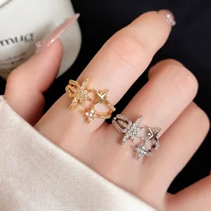 Exquisite gold and silver star open rings with pavé zircon stones for women's jewelry gift.