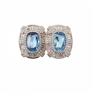 Eleganti orecchini vintage con cristallo blu ovale e diamanti baguette in oro rosa