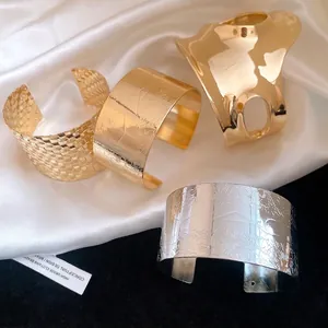 Collection of vintage irregular open cuff bracelets in gold and silver luxury finish