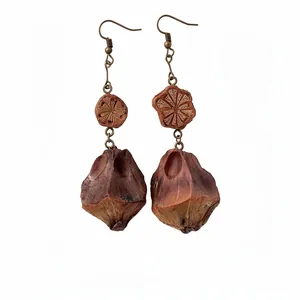 Vintage ethnic drop earrings with natural wood carvings and antique bronze hooks for women