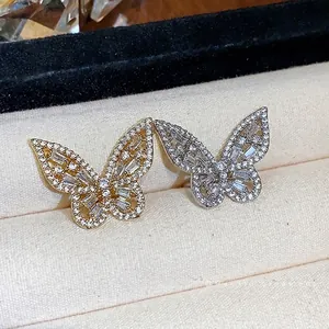 Elegant butterfly-shaped non-pierced ear clips encrusted with sparkling zircon stones in a box