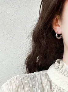 Minimalist silver beaded hoop earrings for women with elegant cold style aesthetic