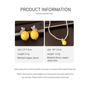 Detail view of vintage lemon jewelry set with resin zircon earrings and necklace