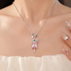 Elegant pink zircon square ice cream pendant necklace with dainty silver chain on a model