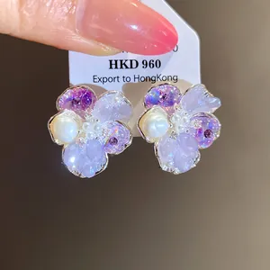 Exquisite purple and white flower stud earrings featuring pearls and sparkling zircon