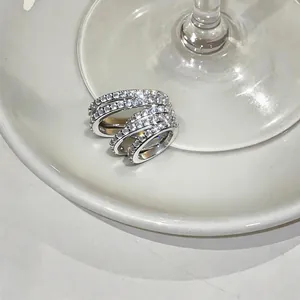 Elegant multi-layered silver zircon ear cuff for non-pierced ears in a luxury style.