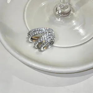 Detailed macro view of a luxury silver multi-layer cubic zirconia ear cuff for women