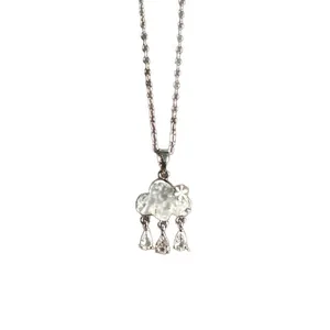 Dainty light blue cloud necklace with zircon raindrop pendants and star detail