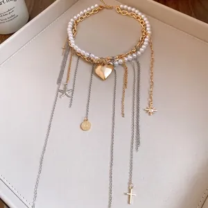 Elegante Vintage Perlen-Lagenkette mit Herz Stern und Kreuz Anhängern für stilvolle Damen