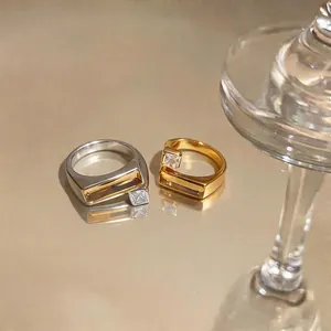 Elegant minimalist geometric rings with square zircon in 18k gold and silver plating.