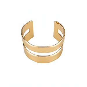 Elegant minimalist double-layer gold open cuff bracelet featuring a glossy metallic finish