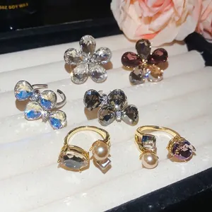 Elegant adjustable open rings with crystal bow and flower designs for women's banquet