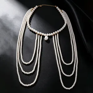 Exquisita cadena corporal de perlas multicapa con detalle de colgante de perla barroca