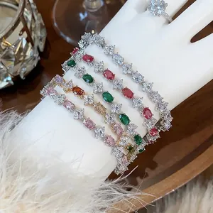 Elegant silver-toned zircon flower bracelets with vibrant colorful gemstones on a model wrist