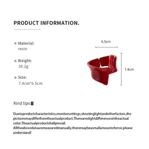 Detailed size and material information for this red resin irregular geometric bangle