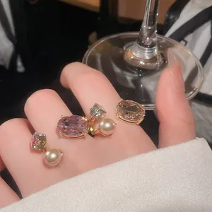 Detail of elegant luxury crystal and pearl rings for sophisticated evening banquet style