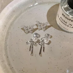 Exquisite zircon butterfly and elegant pearl ribbon tassel clip-on earrings for non-pierced ears