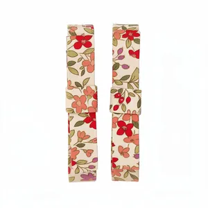 Vintage style floral fabric alligator hair clips with elegant botanical print on white