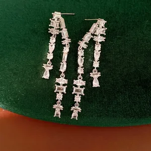 Silver needle long tassel earrings with sparkling zircon stones in geometric cuts