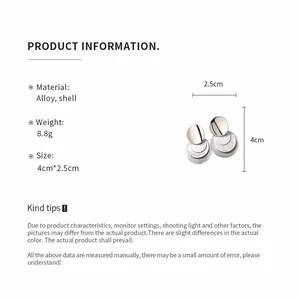 Detail showing measurements and material of shell round pendant earrings