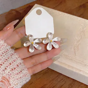 French style silver flower stud earrings with elegant matte finish for women