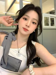 Asian model wearing Korean style zircon star earrings and flower pendant necklace
