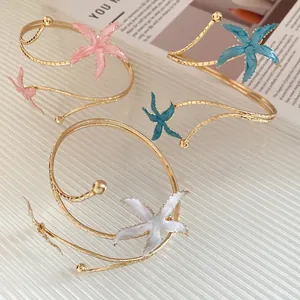 Bracelets manchettes en métal doré avec étoiles de mer en émail coloré pour femmes