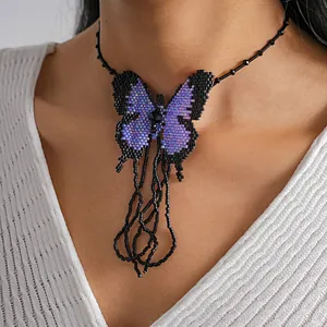 Handmade purple beaded butterfly necklace with elegant black seed bead tassels