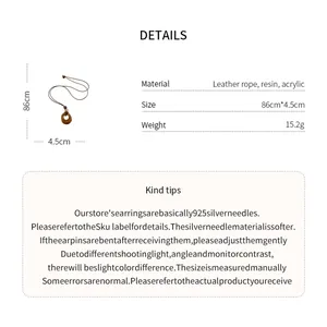 Close-up detail of vintage amber resin pendant necklace and product parameters
