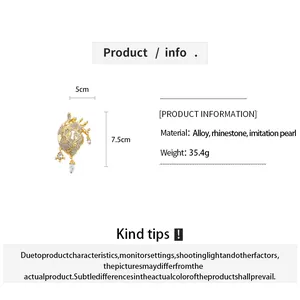 Detailed product info of gold heart brooch showing 5x7.5cm size and materials.