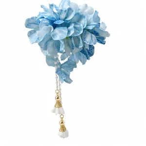 Elegant blue and white bohemian fabric flower hair clip featuring long pearl bead tassels